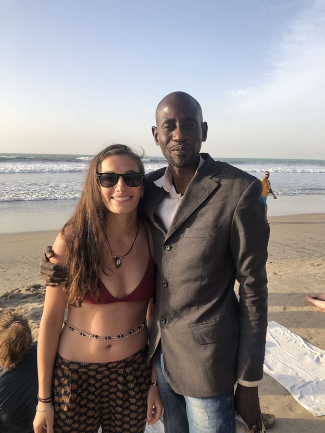 Mamadou and Clara Sherwood on a beach in The Gambia